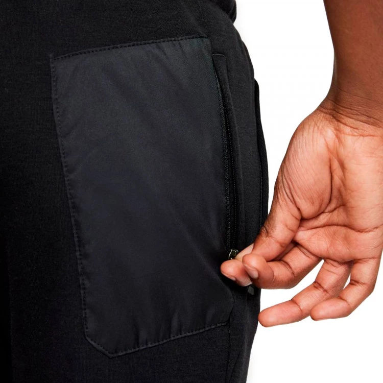 pantalon-largo-nike-tottenham-hostpur-fc-travel-fleece-2021-2022-nino-black-venom-green-3