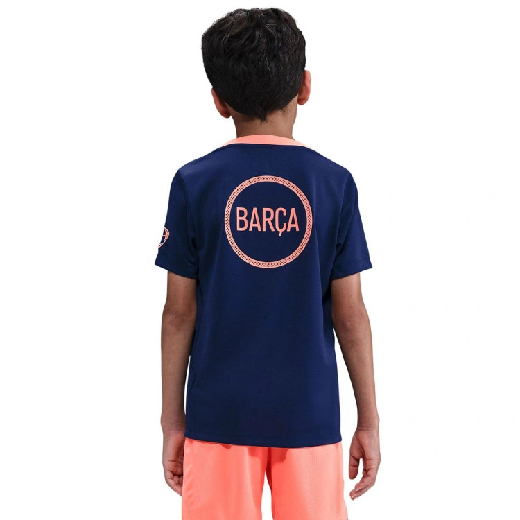 camiseta-nike-fc-barcelona-pre-match-2025-2026-nino-midnight-navy-bright-mango-1