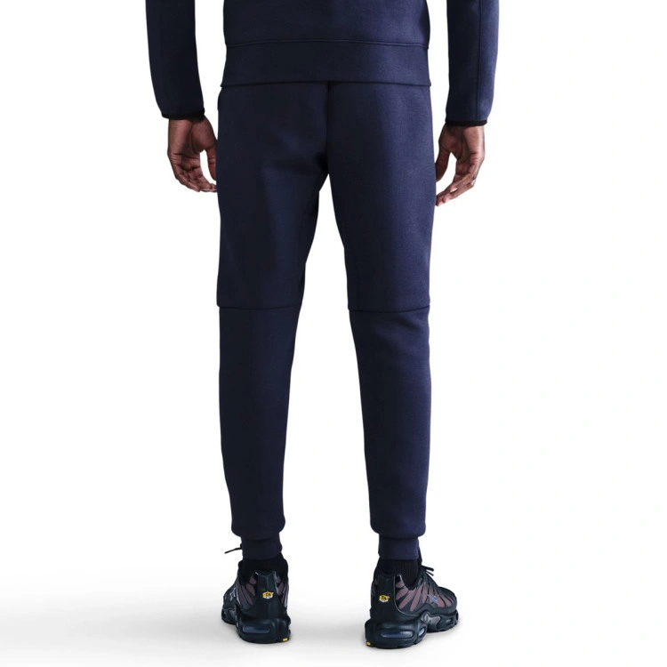 pantalon-largo-nike-fc-barcelona-fanswear-2025-2026-midnight-navy-bright-mango-no-sponsor-1