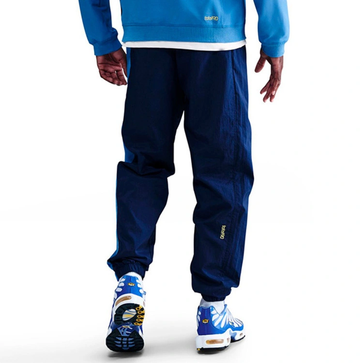 pantalon-largo-nike-tottenham-hotspur-fc-fanswear-2025-2026-blue-void-pacific-blue-dynamic-yellow-no-spon-1