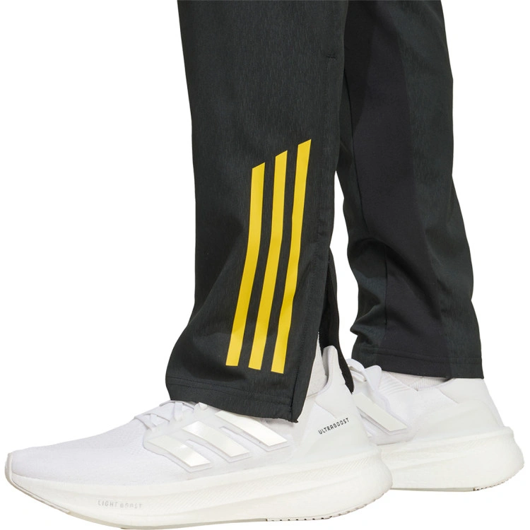 pantalon-largo-adidas-manchester-united-training-2025-2026-black-hi-res-blue-tribe-yellow-3