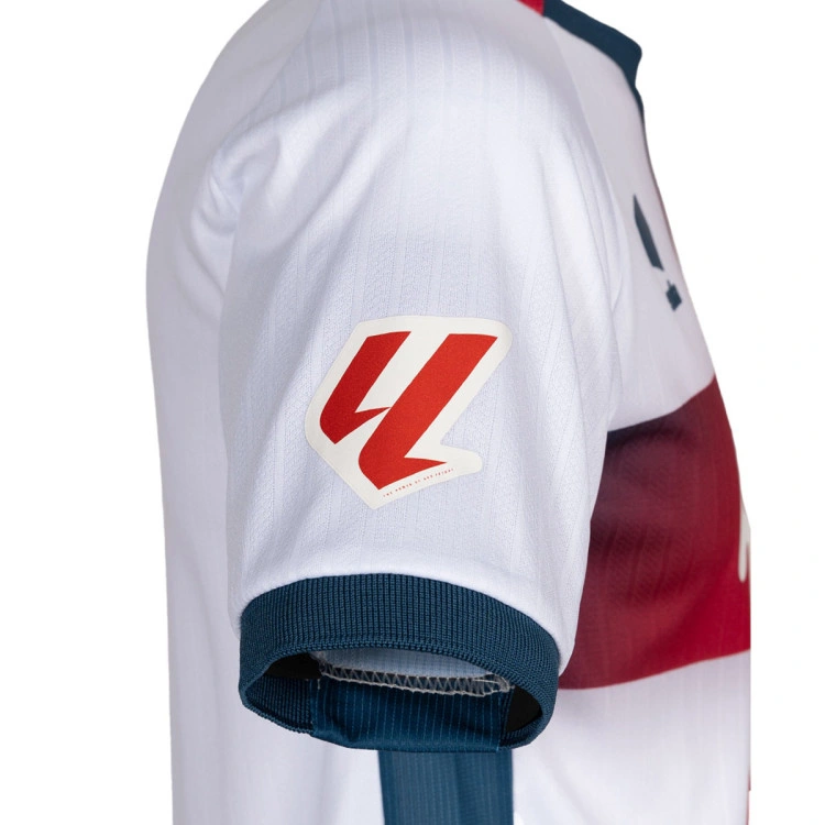 camiseta-soka-sociedad-deportiva-huesca-segunda-equipacion-2025-2026-nino-white-sdh-red-sdh-blue-9