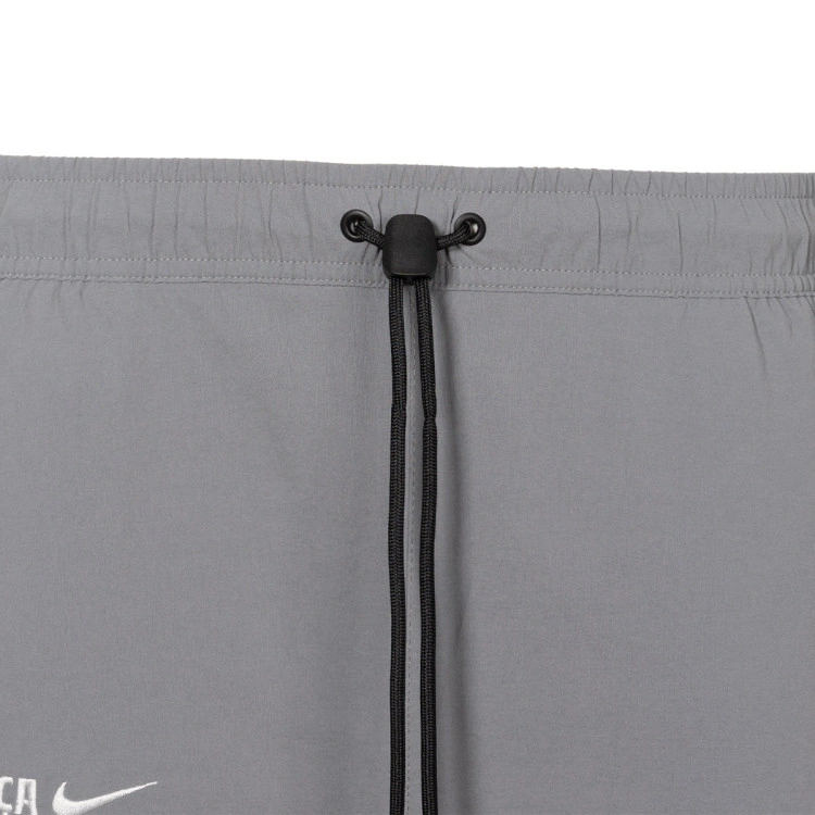 pantalon-largo-nike-fc-barcelona-woven-tech-fanswear-2025-2026-smoke-grey-lt-smoke-grey-lt-smoke-grey-no-spo-5