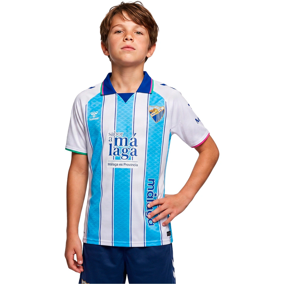 camiseta-hummel-malaga-cf-primera-equipacion-2026-2027-nino-blue-white-0