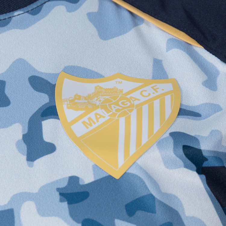 camiseta-hummel-malaga-cf-pre-match-2026-2027-azul-4